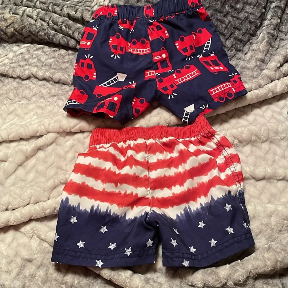 Carter’s~2 Boys Swim Shorts in Red, White and Blue. Elastic Waistband Size:12M